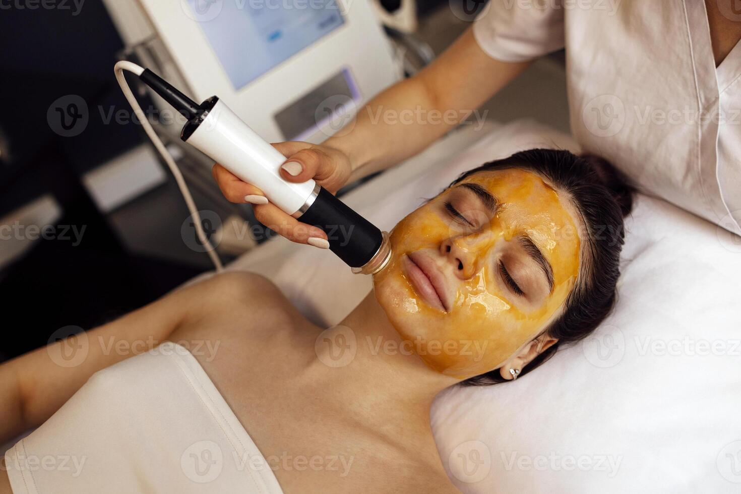Woman during the oxygen mesotherapy procedure at the beauty salon photo