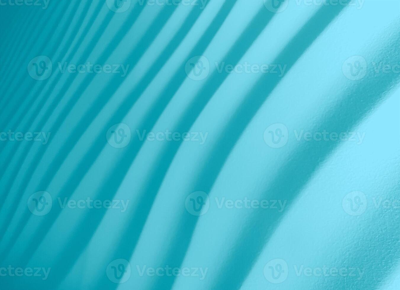 Beautiful striped bring blue background. Abstract cyan backdrop with shadow and light alternating pattern. photo