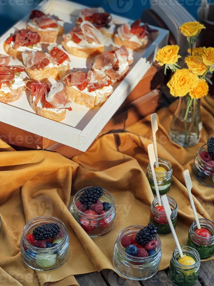 Backyard barbeque party at summer, elegant decoration, luxury catering, tasty and beautiful food photo