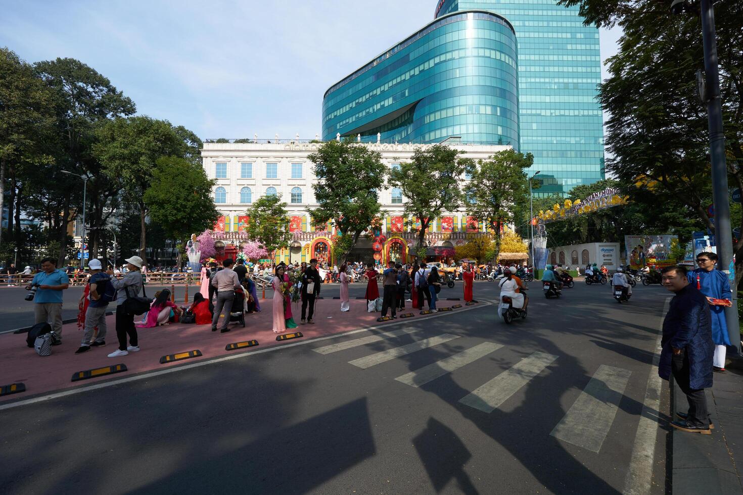 Hochiminh city, Jan 21, 2024 Early in the morning at the Diamond Plaza, many people are taking New Year's photos with family and friends
