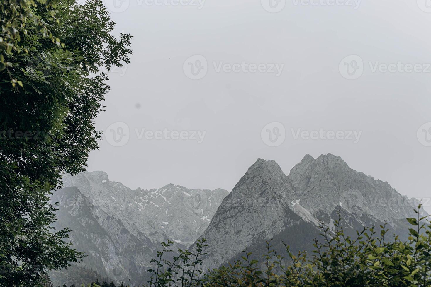 Landscape view of a gray rocky mountains isolated on white background. photo