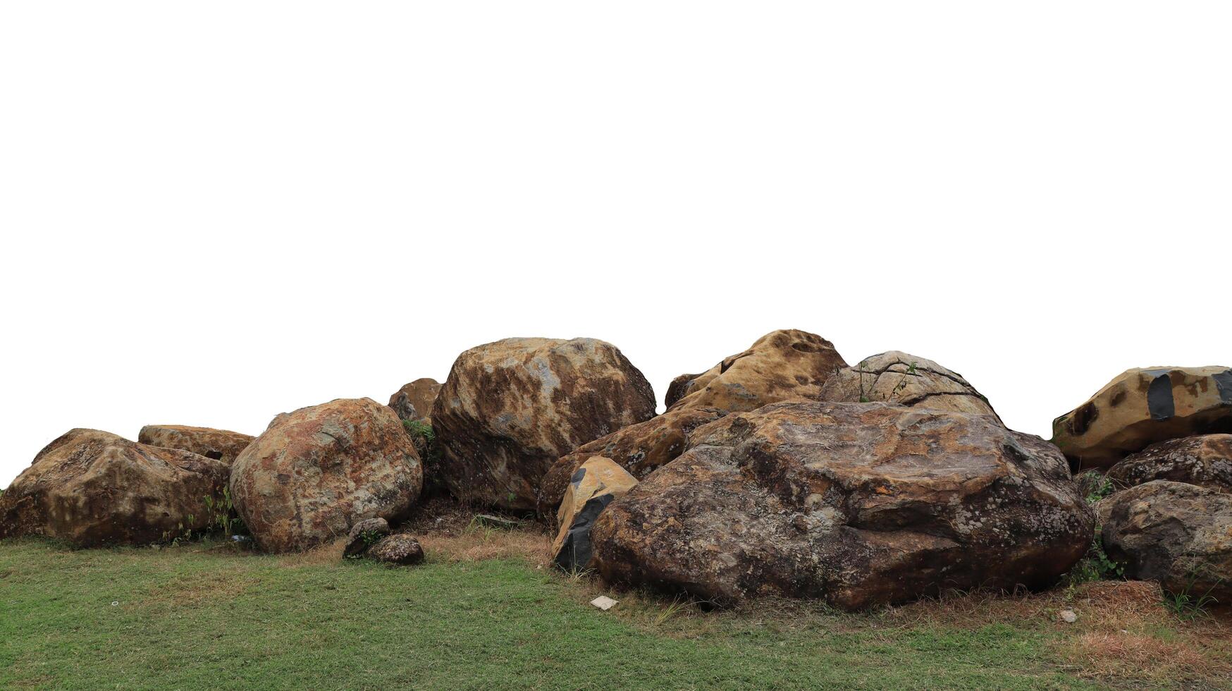 collection of large rocks isolated on white background photo
