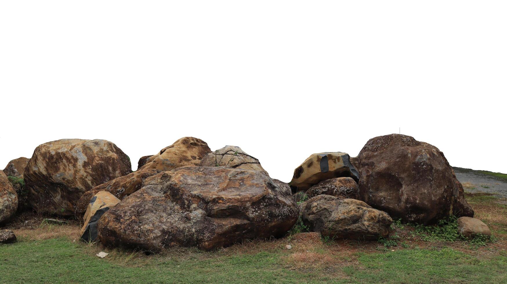 collection of large rocks isolated on white background photo