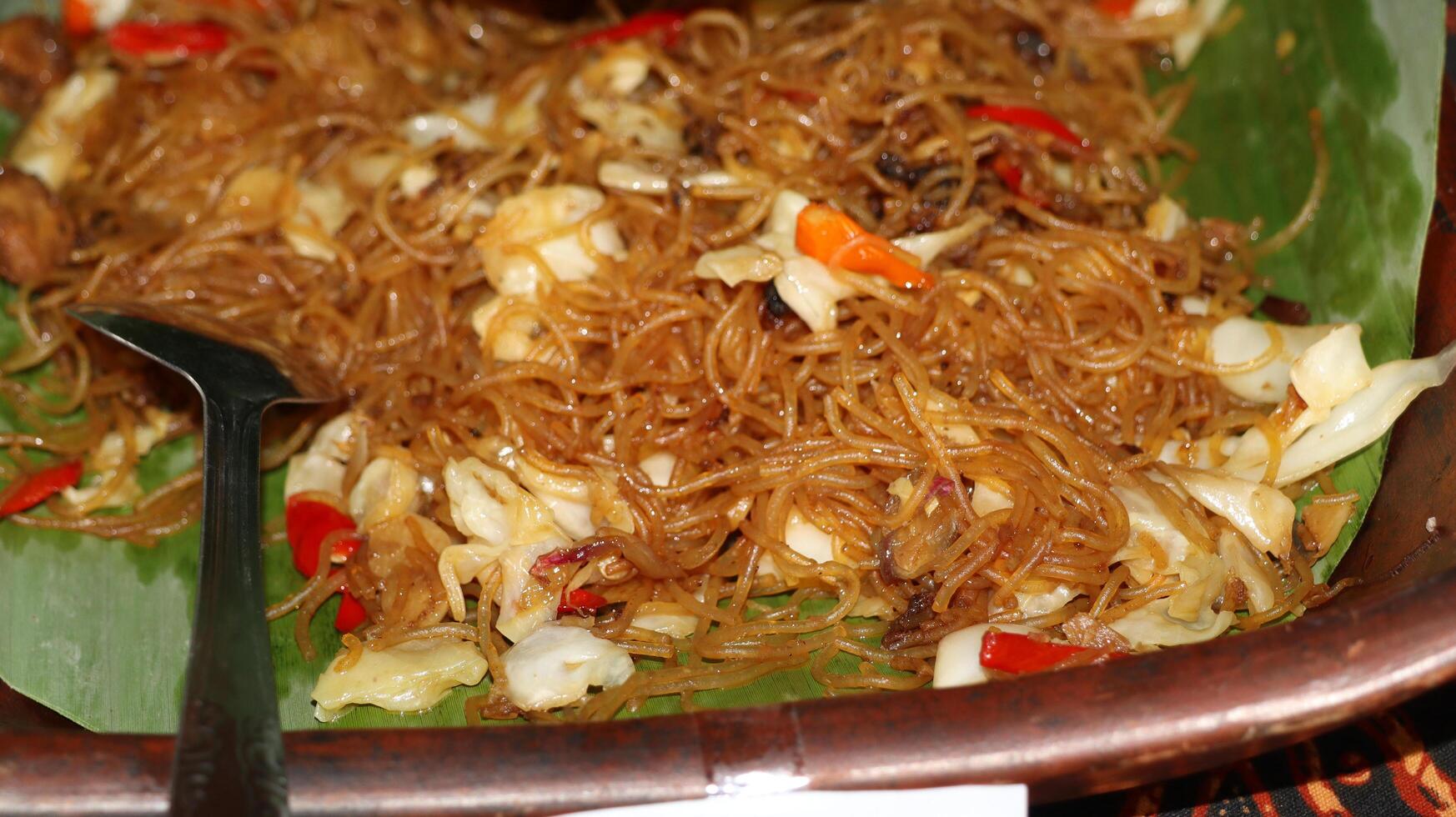 Bihun goreng rice vermicelli with vegetables and chili photo