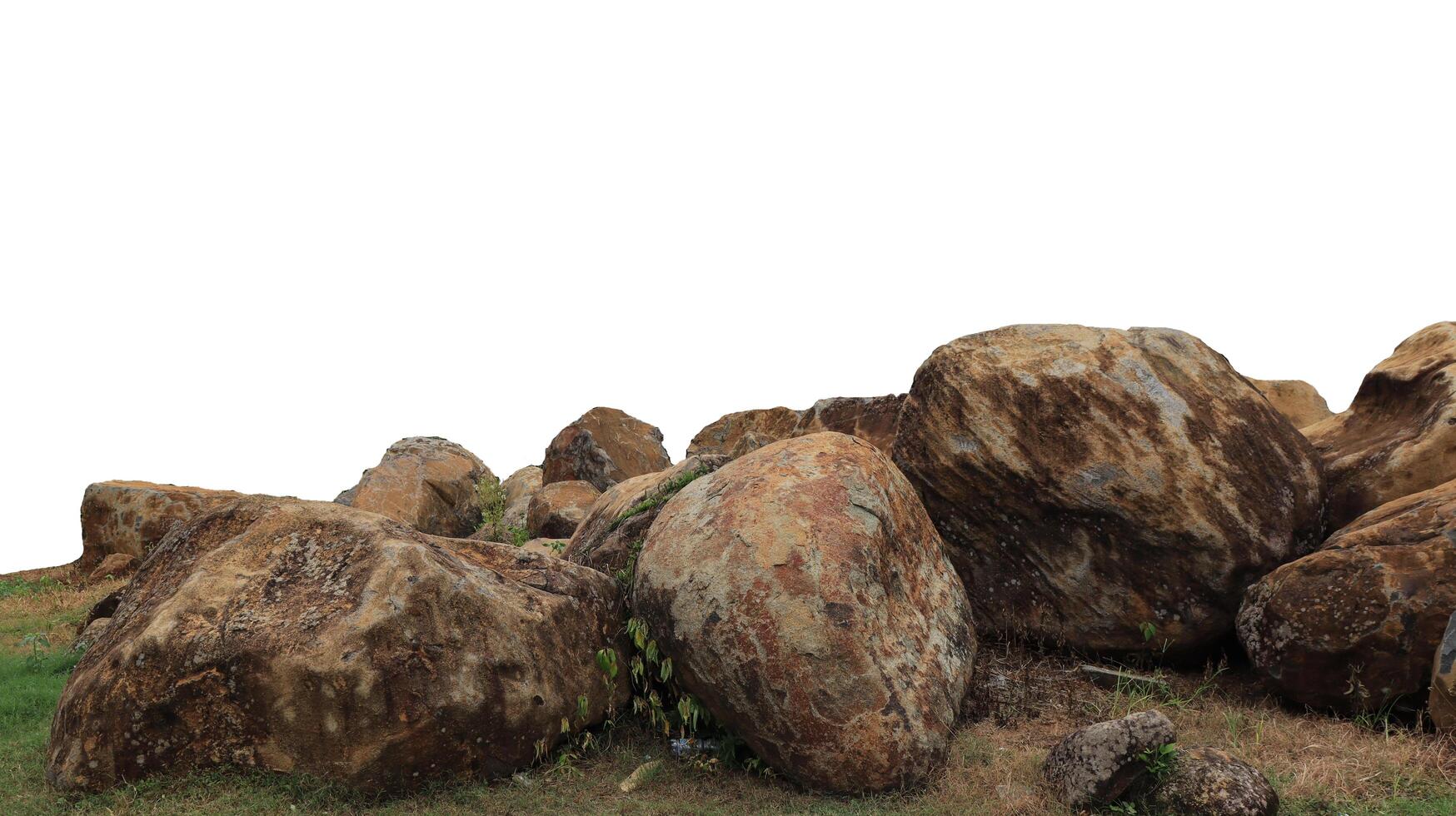 collection of large rocks isolated on white background photo