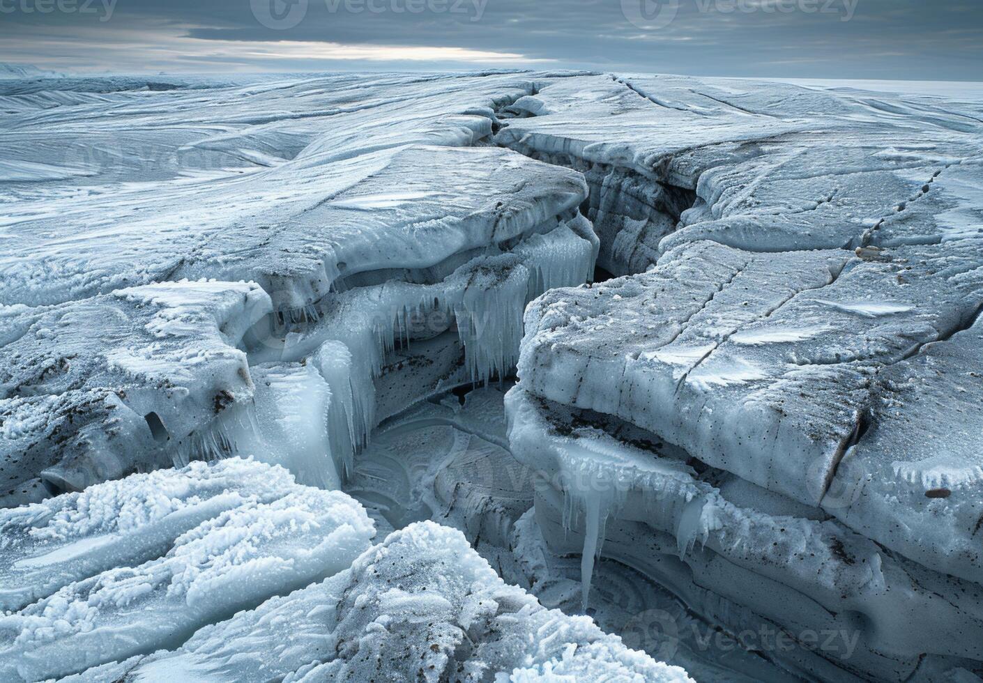 A detailed shot of the cracks forming in a melting glacier photo