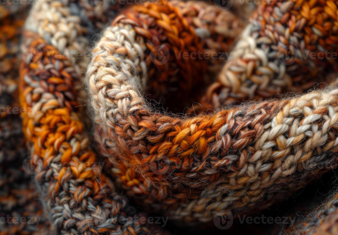 A macro shot of a knitted wool throw, focusing on the interwoven fibers and texture photo