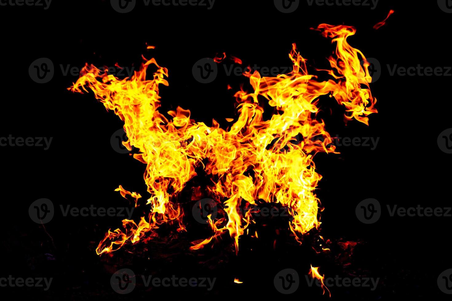 Fire flame texture. Burning material backdrop. Burn effect pattern. Blaze and torch wallpaper. Heat and haze backdrop. photo