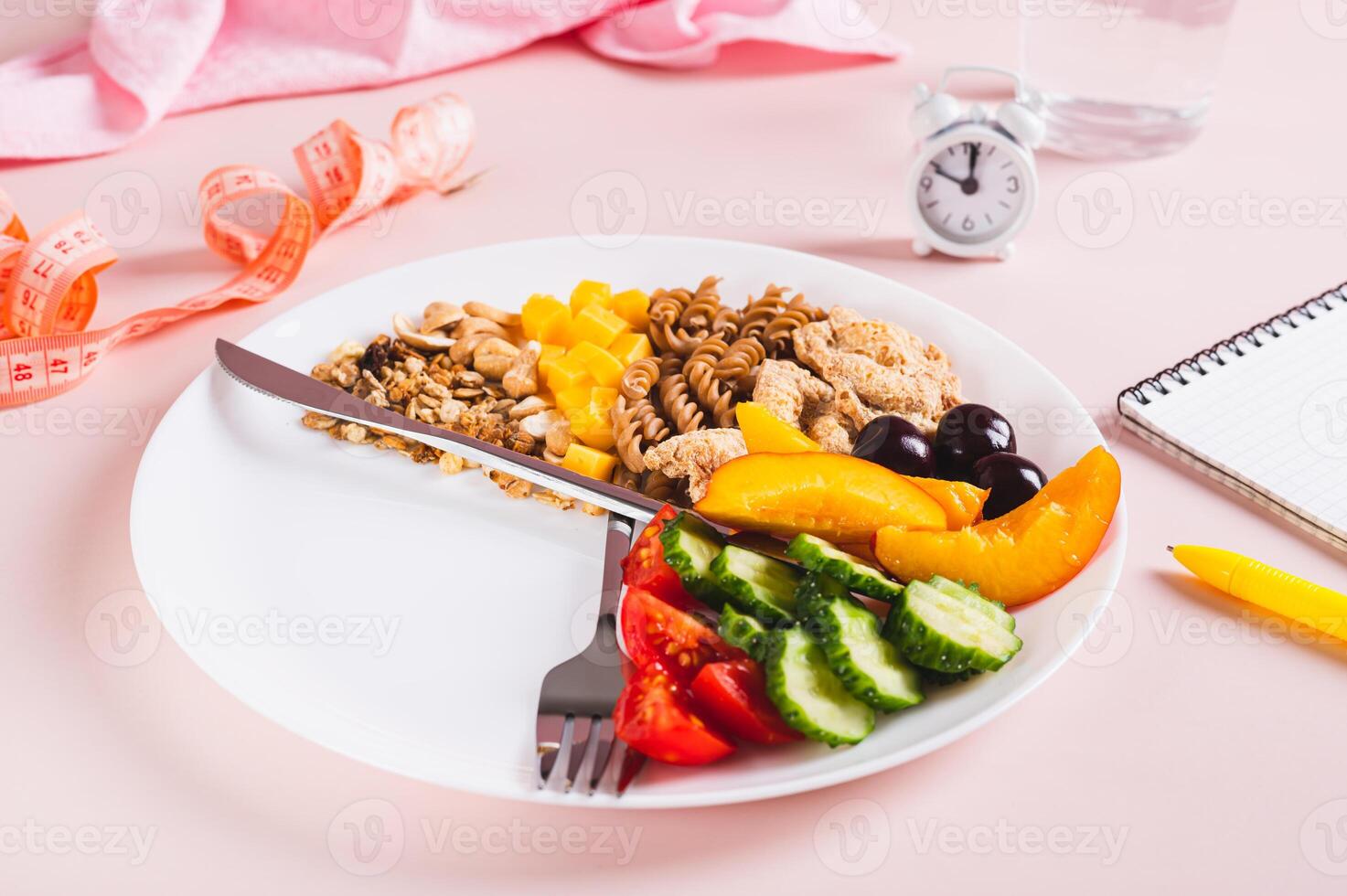 Concept individual meal plan by time food on plate on table photo