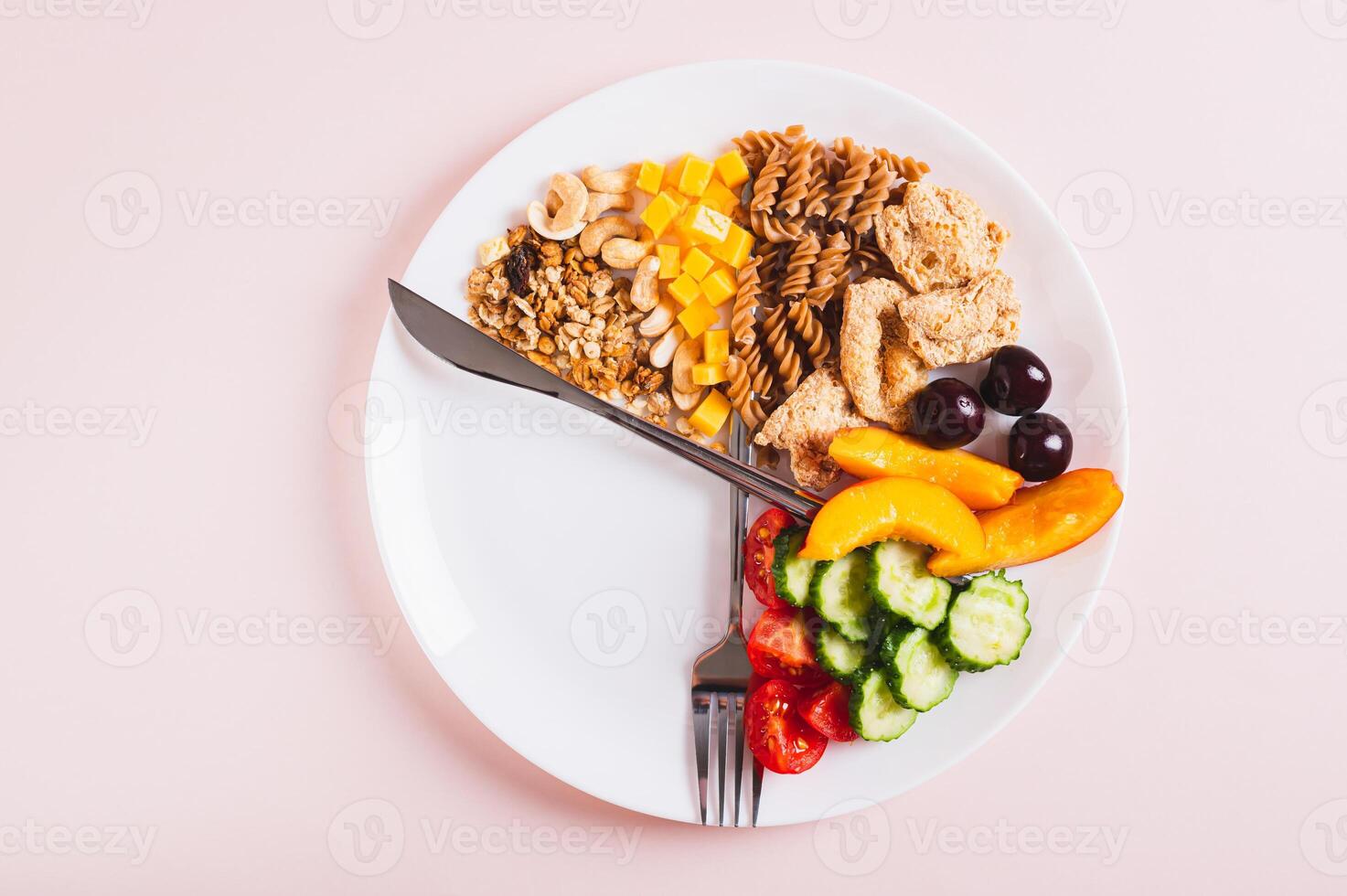 Concept individual meal plan by time food on plate on table top view photo