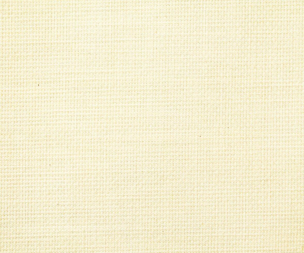 Natural Linen Material Textile Canvas Fabric Texture Background Close-up Detail of Fabric Natural Color Hemp Material Pattern Design Wallpaper. Can be Used as Background or For Graphic Design photo