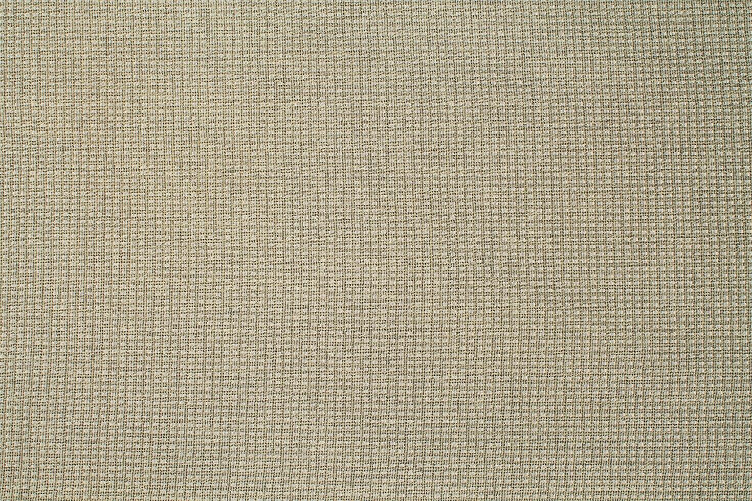 Natural Linen Material Textile Canvas Fabric Texture Background Close-up Detail of Fabric Natural Color Hemp Material Pattern Design Wallpaper. Can be Used as Background or For Graphic Design photo