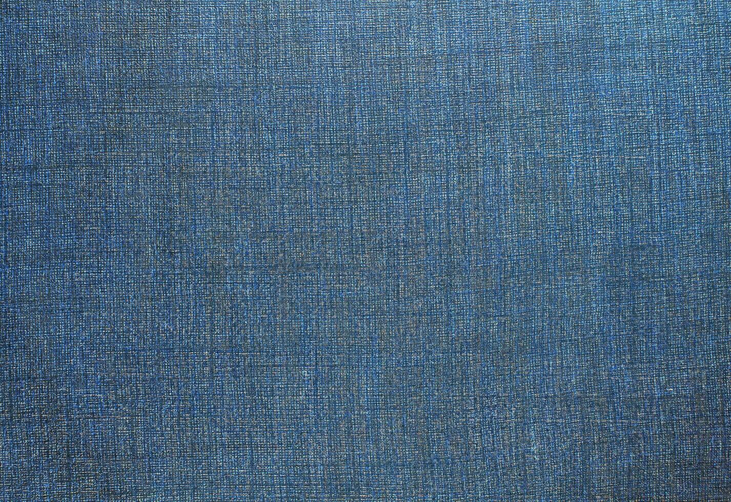 Natural Linen Material Textile Canvas Fabric Texture Background Close-up Detail of Fabric Natural Color Hemp Material Pattern Design Wallpaper. Can be Used as Background or For Graphic Design photo
