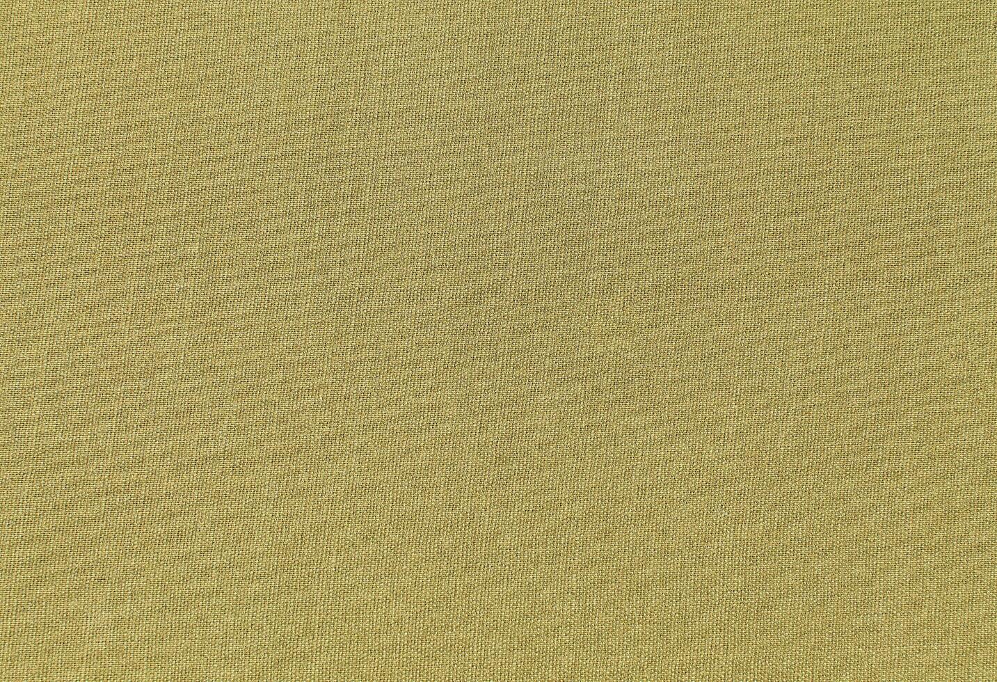 Natural Linen Material Textile Canvas Fabric Texture Background Close-up Detail of Fabric Natural Color Hemp Material Pattern Design Wallpaper. Can be Used as Background or For Graphic Design photo