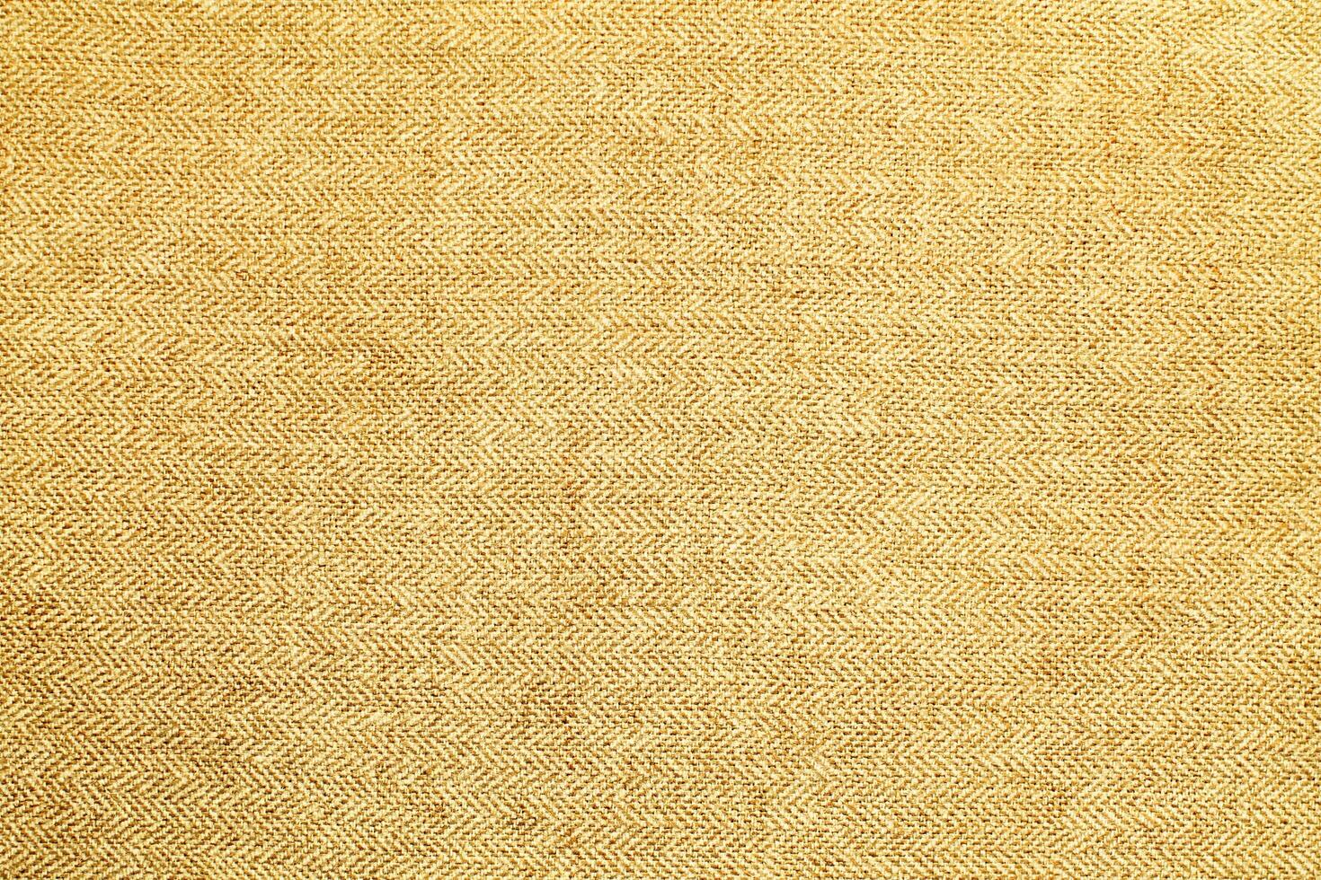 Natural Linen Material Textile Canvas Fabric Texture Background Close-up Detail of Fabric Natural Color Hemp Material Pattern Design Wallpaper. Can be Used as Background or For Graphic Design photo