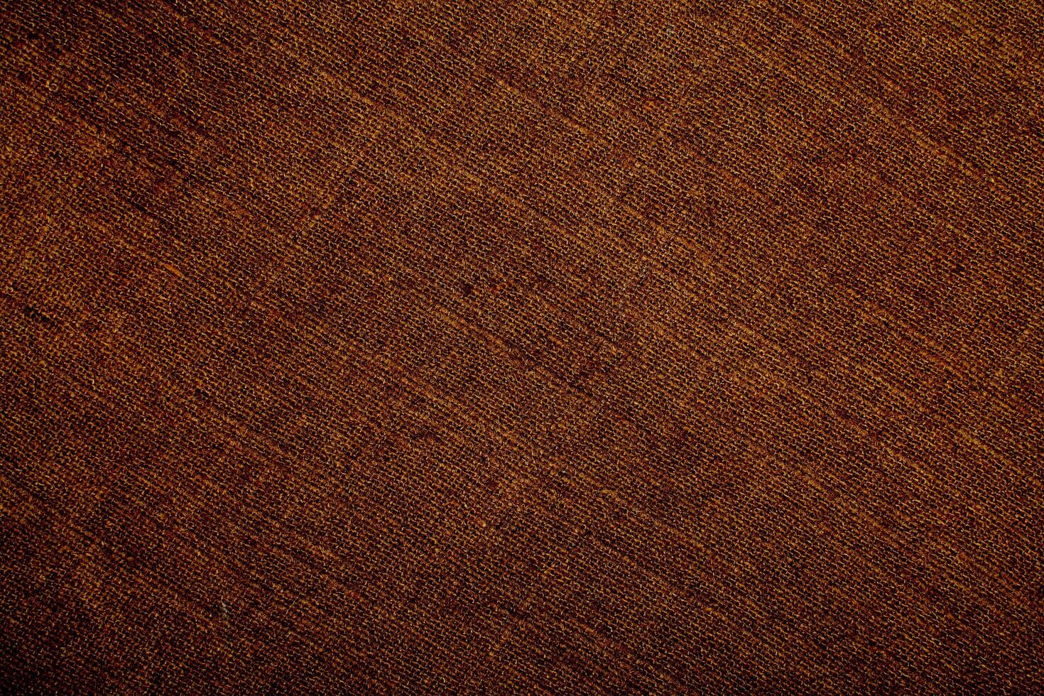 Natural Linen Material Textile Canvas Fabric Texture Background Close-up Detail of Fabric Natural Color Hemp Material Pattern Design Wallpaper. Can be Used as Background or For Graphic Design photo