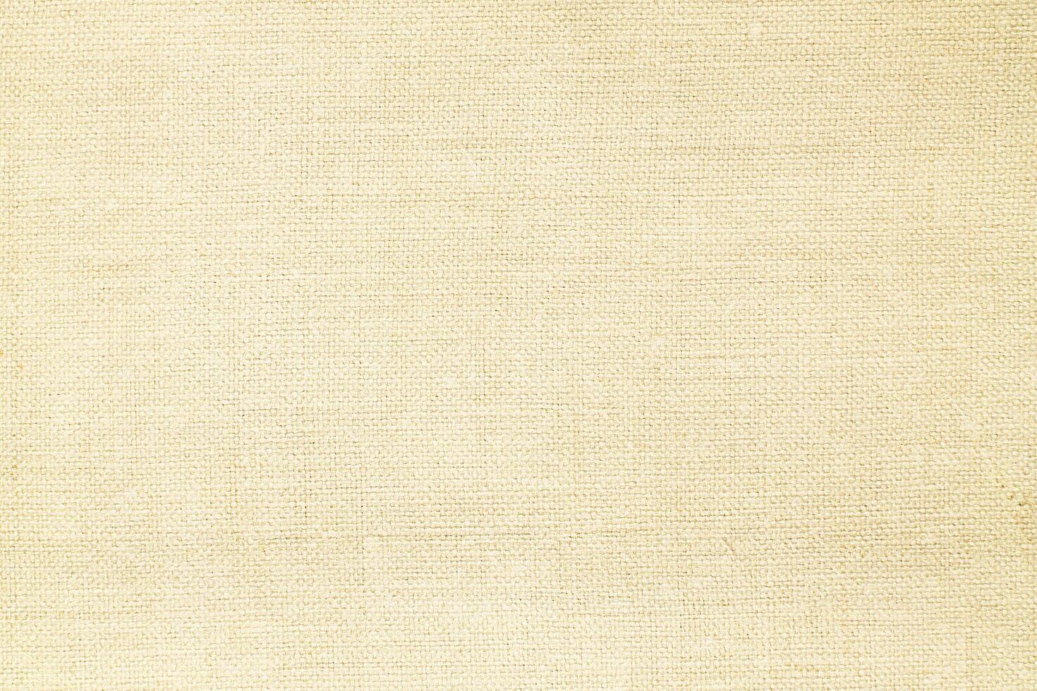 Natural Linen Material Textile Canvas Fabric Texture Background Close-up Detail of Fabric Natural Color Hemp Material Pattern Design Wallpaper. Can be Used as Background or For Graphic Design photo