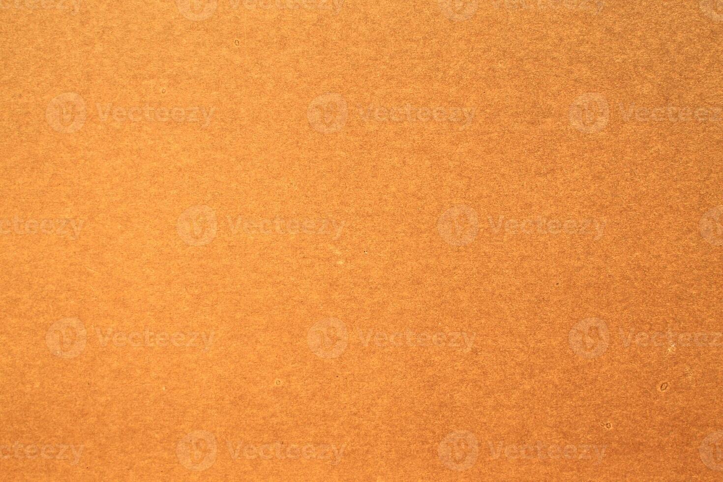 A brown paper background with a white border photo