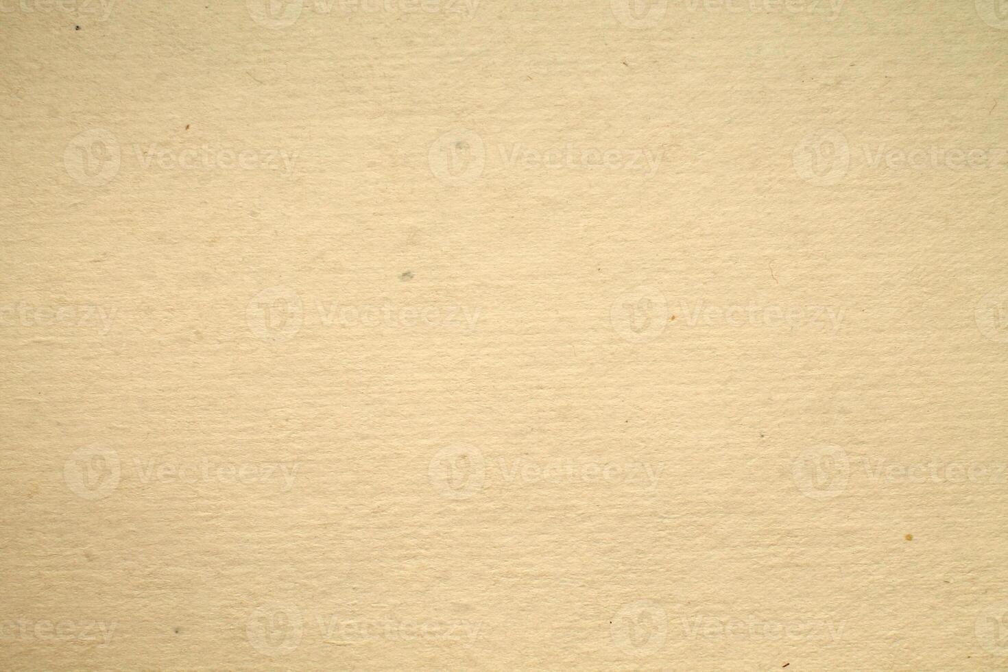 A brown paper texture with a few holes photo