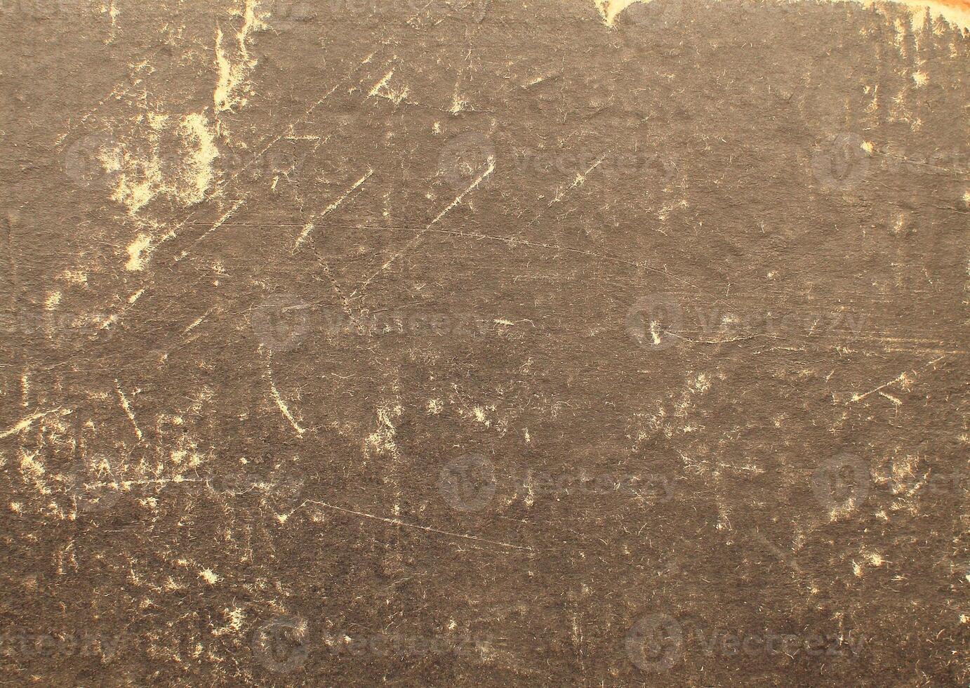 A close up of a dirty old wall photo