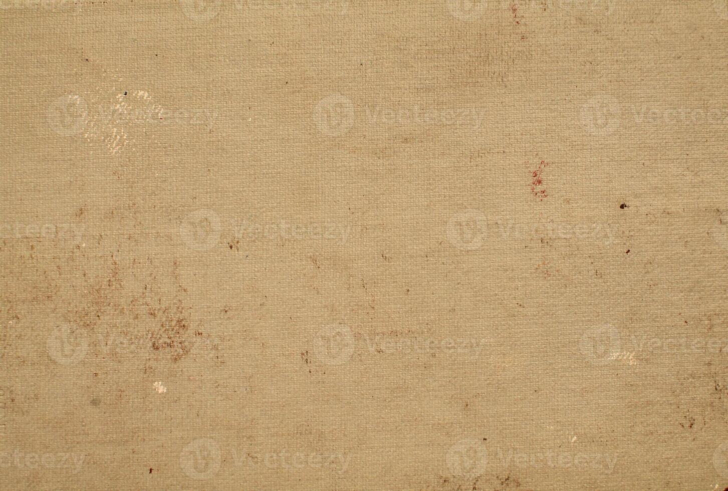 An old, dirty paper with some stains on it photo