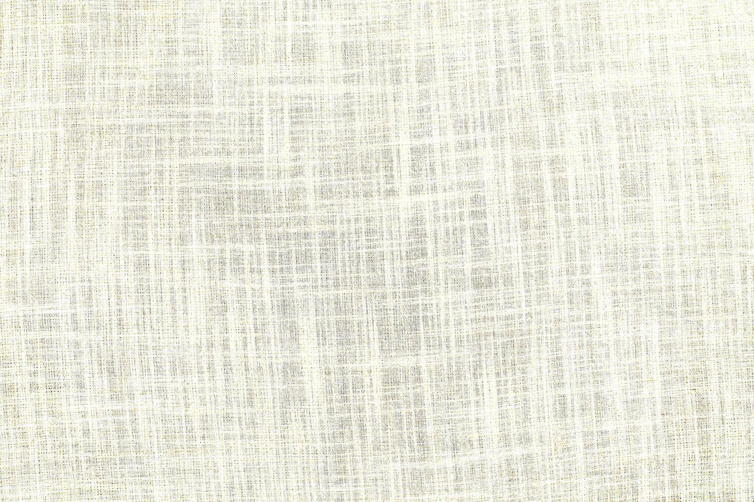 Natural Linen Material Textile Canvas Fabric Texture Background Close-up Detail of Fabric Natural Color Hemp Material Pattern Design Wallpaper. Can be Used as Background or For Graphic Design photo