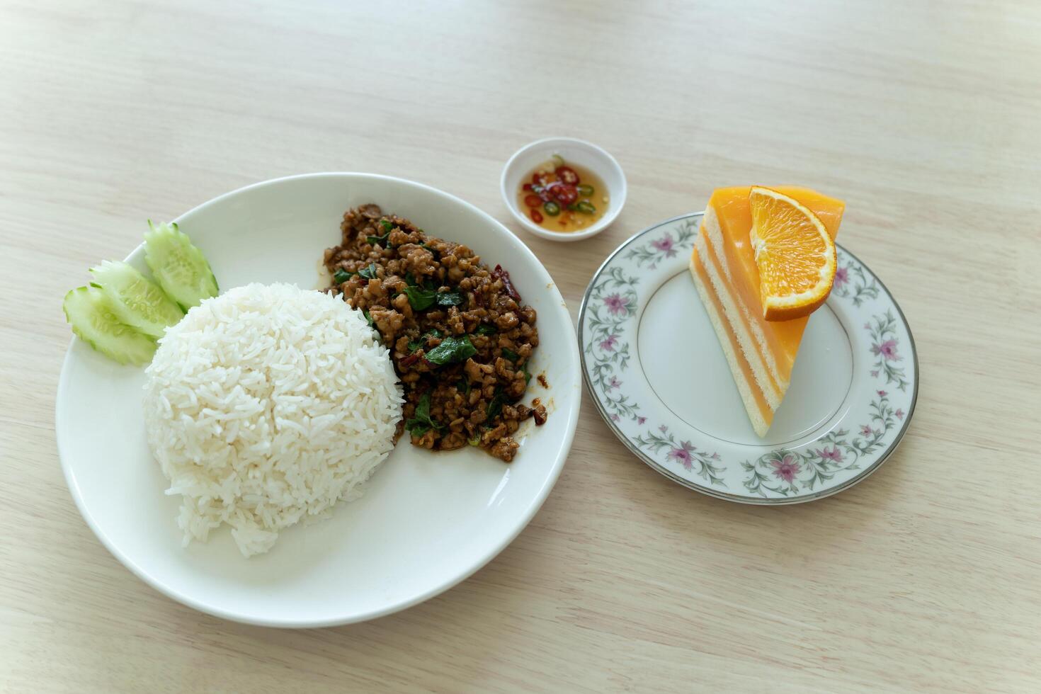 Basil fried rice with orange cake photo