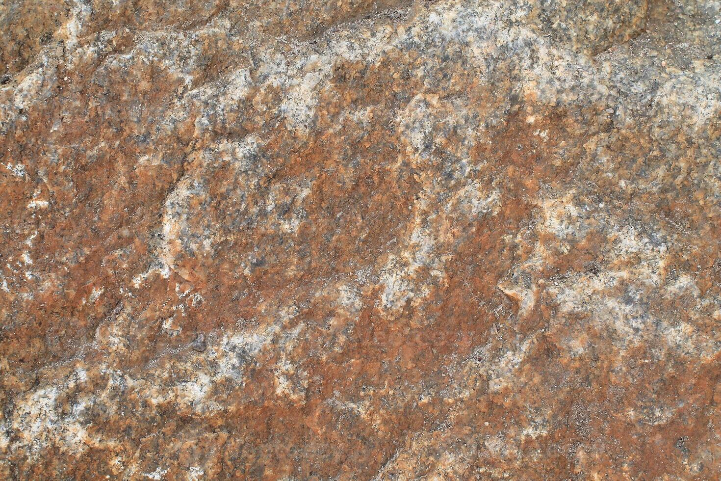 Abstract natural rock stone granite grunge rusty metal texture design background natural color stone material granite design wallpaper. Close-up detail of natural stone photo