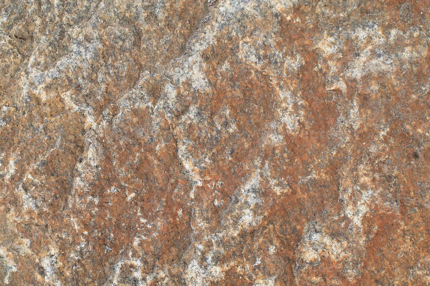 Abstract natural rock stone granite grunge rusty metal texture design background natural color stone material granite design wallpaper. Close-up detail of natural stone photo