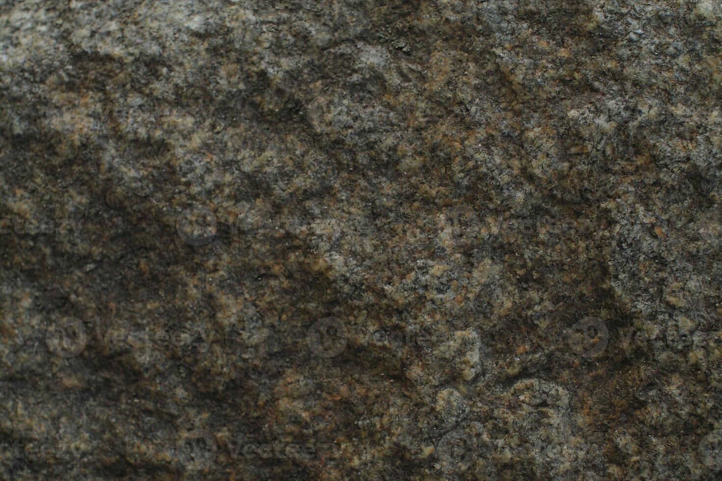 Abstract natural rock stone granite grunge rusty metal texture design background natural color stone material granite design wallpaper. Close-up detail of natural stone photo