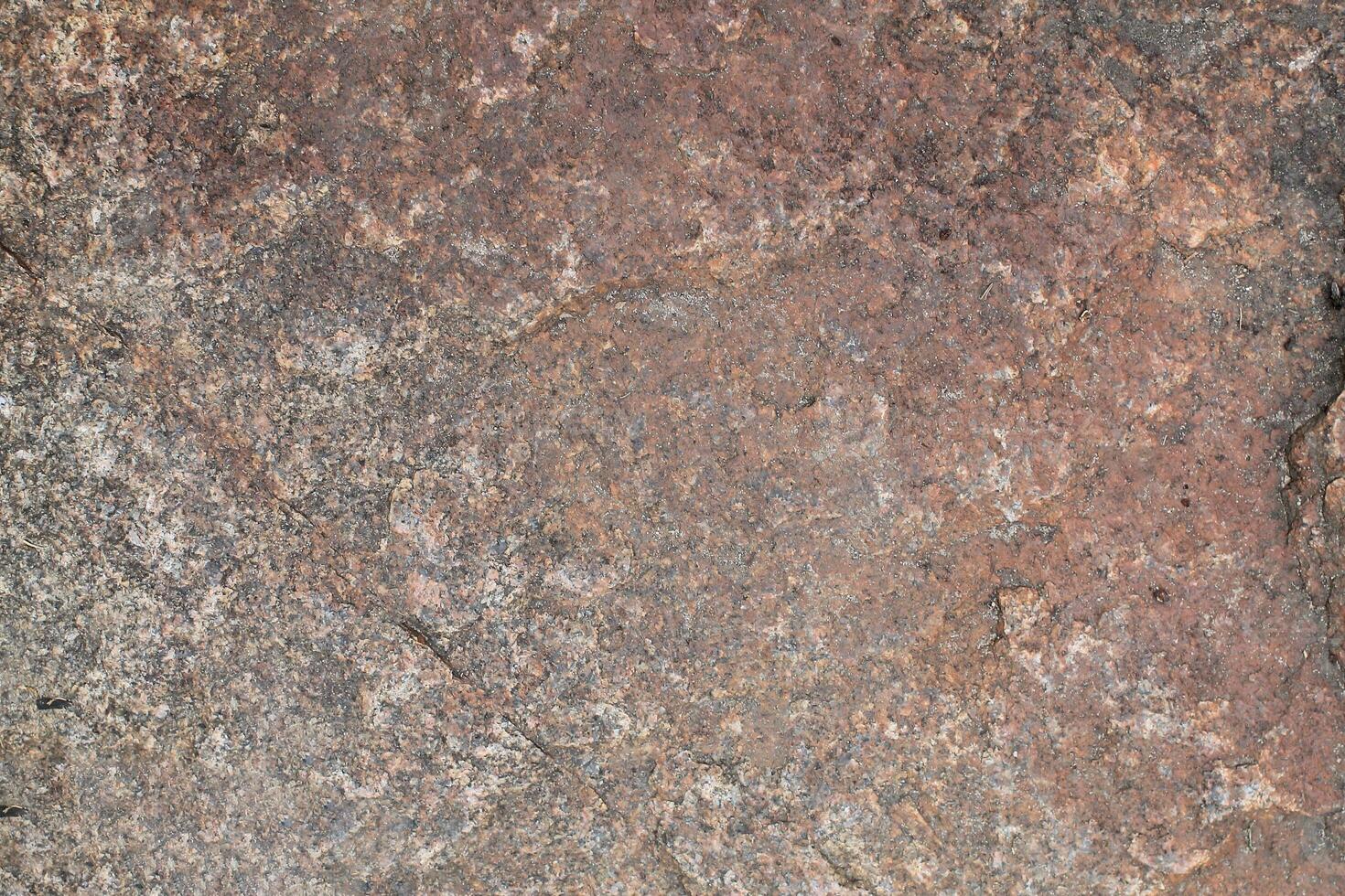 Abstract natural rock stone granite grunge rusty metal texture design background natural color stone material granite design wallpaper. Close-up detail of natural stone photo