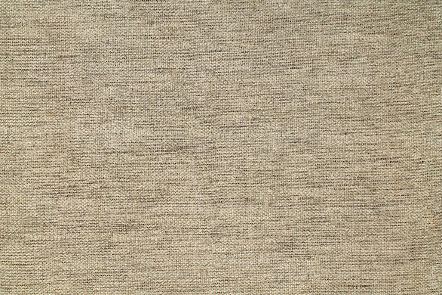Natural linen material textile canvas Fabric texture background Close-up detail of fabric natural color Hemp material pattern design wallpaper. can be used as background or for graphic design photo