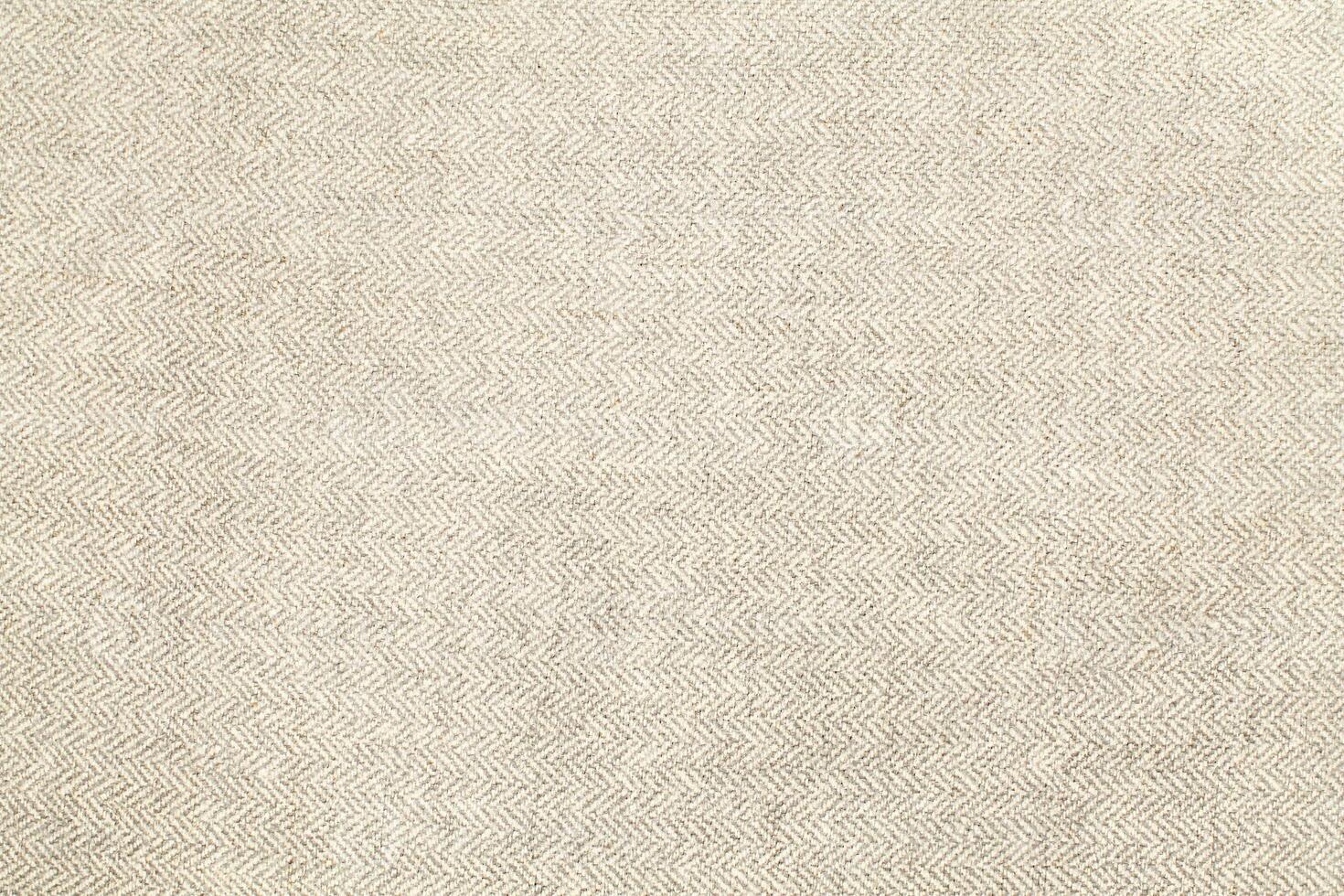 Natural linen material textile canvas Fabric texture background Close-up detail of fabric natural color Hemp material pattern design wallpaper. can be used as background or for graphic design photo
