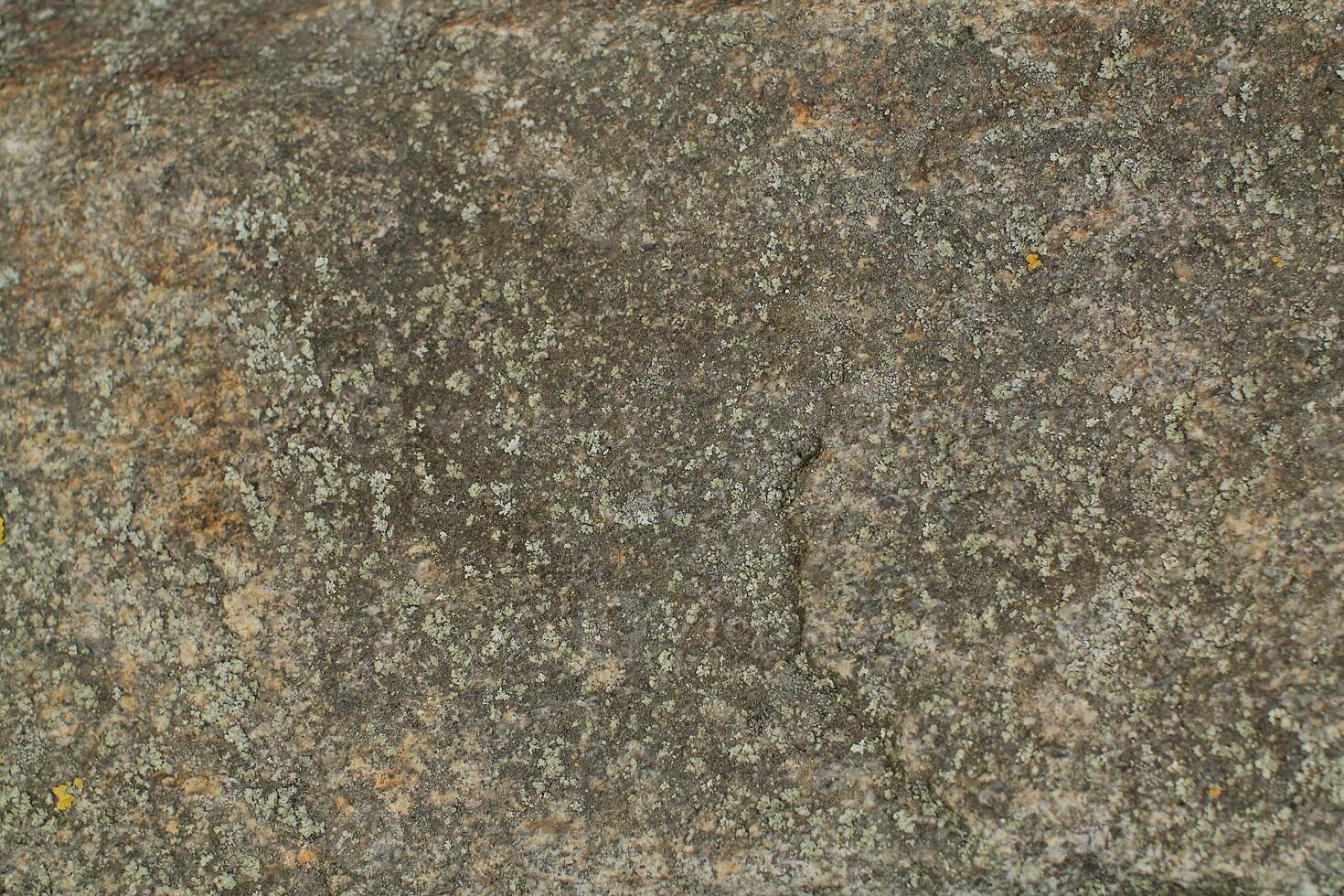 Abstract natural rock stone granite grunge rusty metal texture design background natural color stone material granite design wallpaper. Close-up detail of natural stone photo