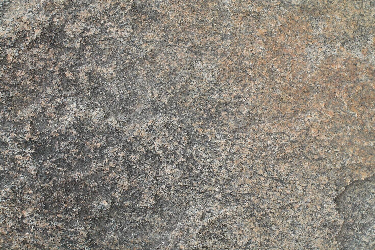 Abstract natural rock stone granite grunge rusty metal texture design background natural color stone material granite design wallpaper. Close-up detail of natural stone photo
