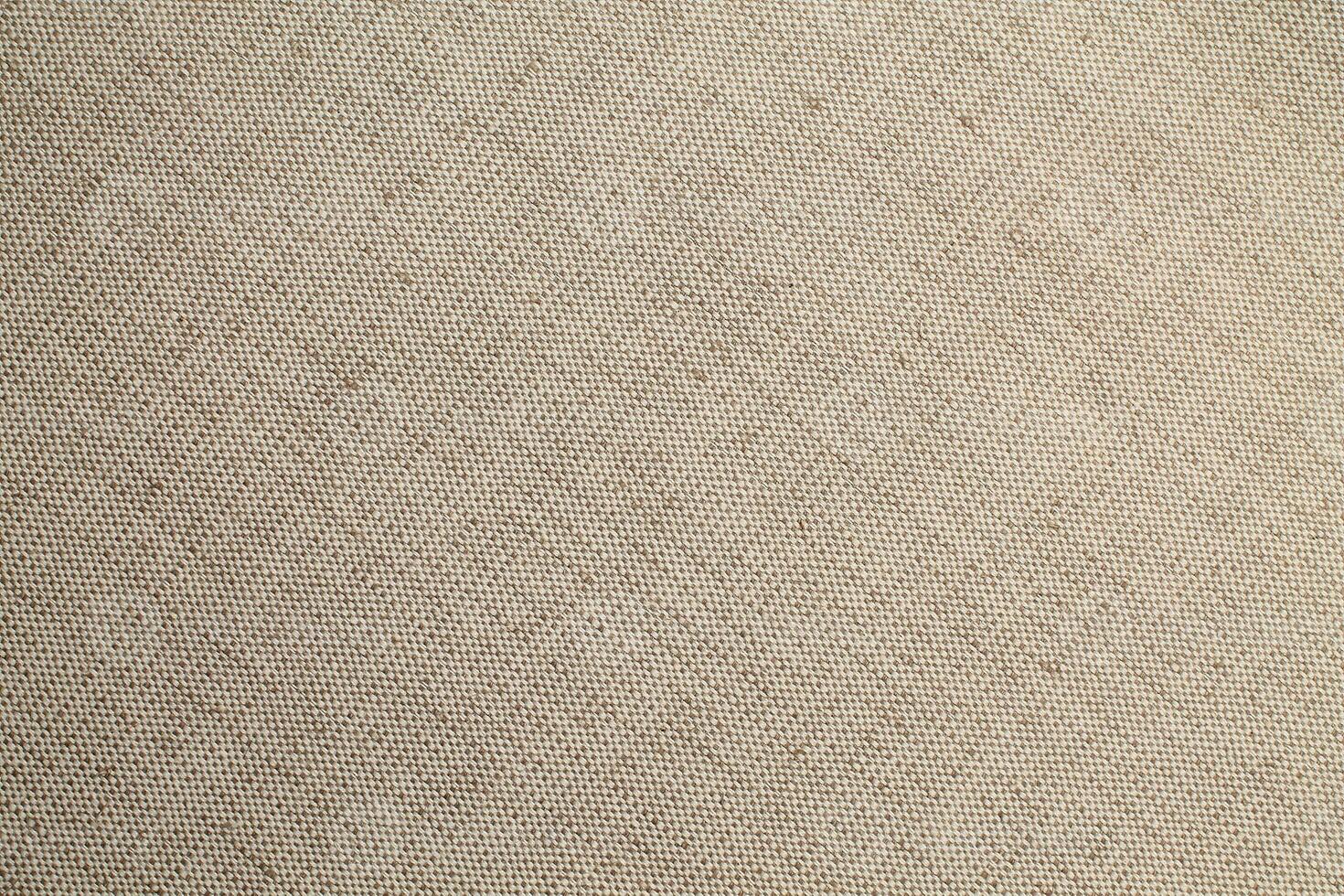 Natural linen material textile canvas Fabric texture background Close-up detail of fabric natural color Hemp material pattern design wallpaper. can be used as background or for graphic design photo