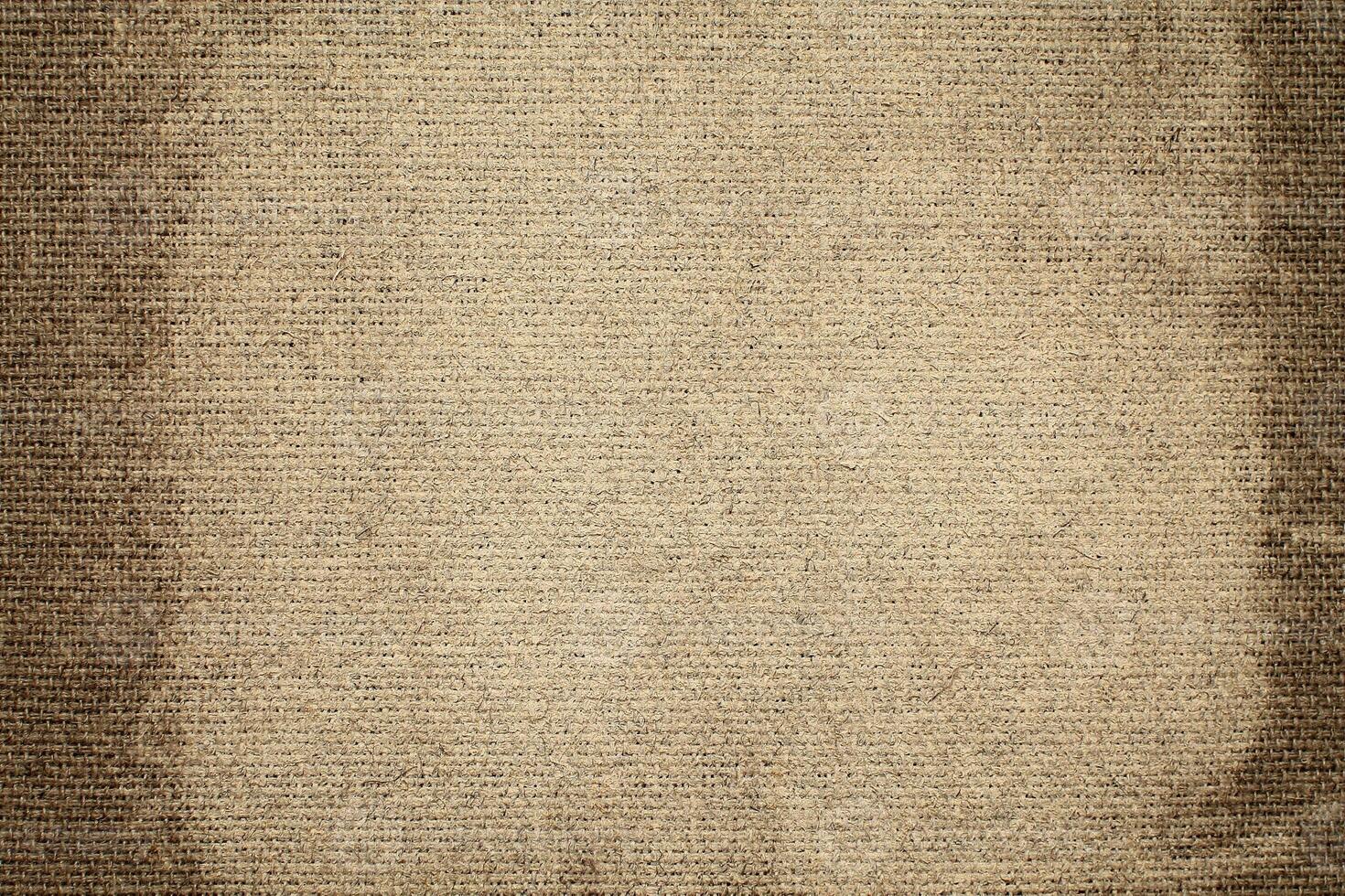 Natural linen material textile canvas Fabric texture background Close-up detail of fabric natural color Hemp material pattern design wallpaper. can be used as background or for graphic design photo