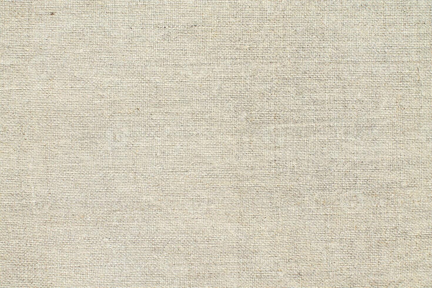 Natural linen material textile canvas Fabric texture background Close-up detail of fabric natural color Hemp material pattern design wallpaper. can be used as background or for graphic design photo