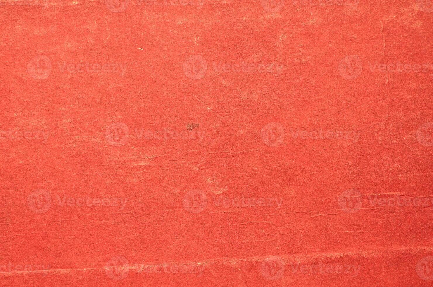 A red cloth with a hole in it photo