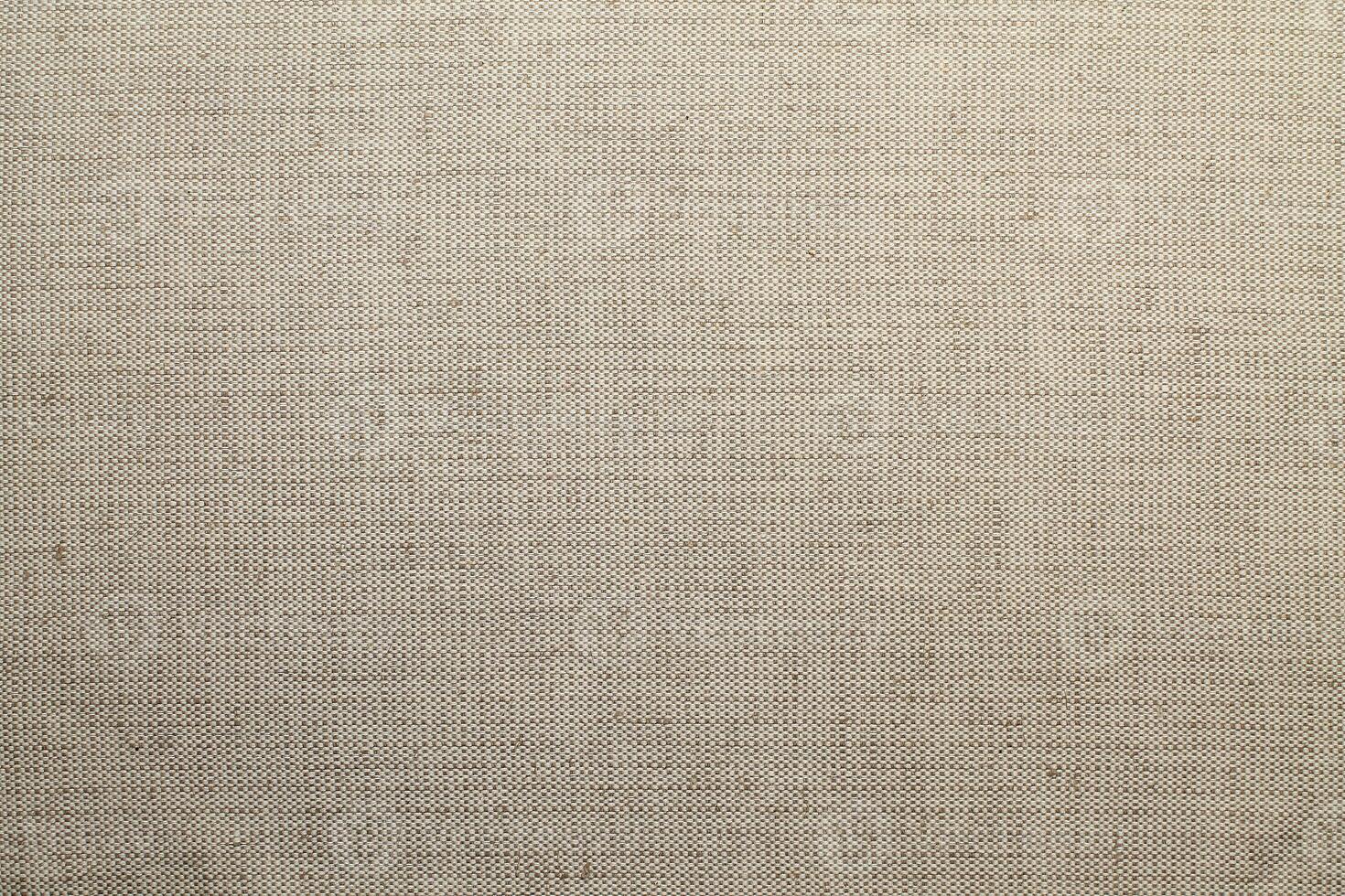 Natural linen material textile canvas Fabric texture background Close-up detail of fabric natural color Hemp material pattern design wallpaper. can be used as background or for graphic design photo