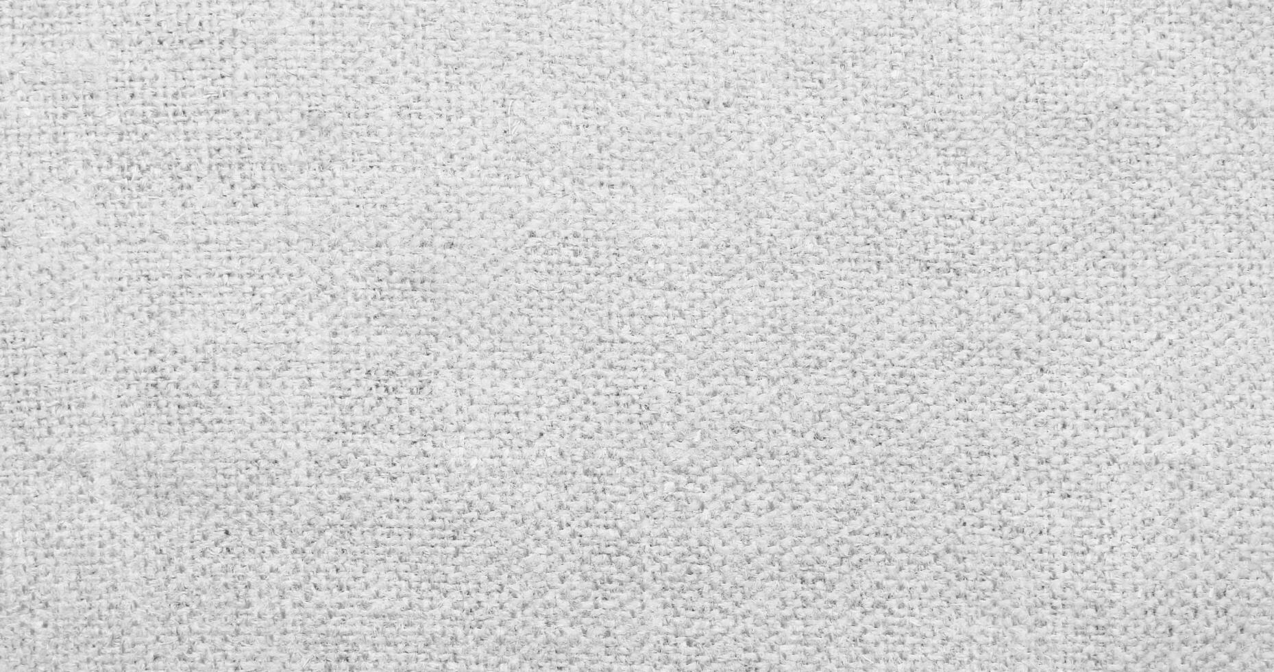 Natural linen material textile canvas Fabric texture background Close-up detail of fabric natural color Hemp material pattern design wallpaper. can be used as background or for graphic design photo