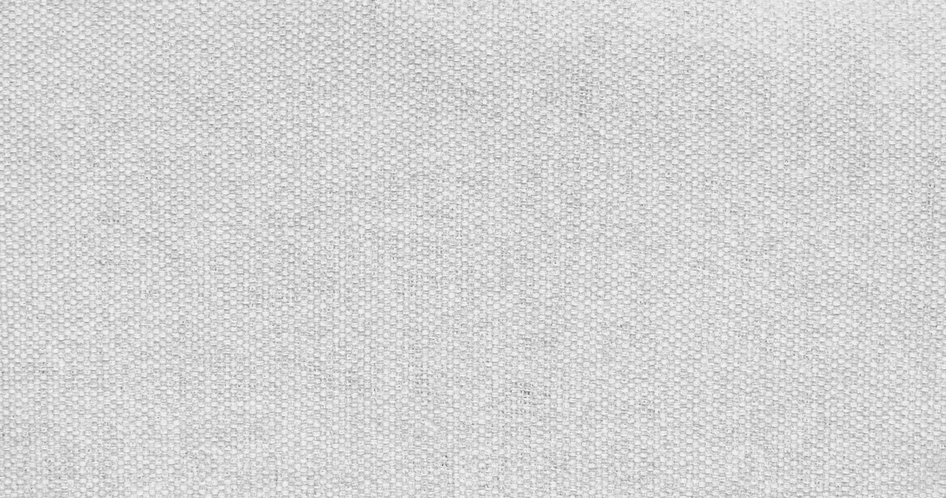 Natural linen material textile canvas Fabric texture background Close-up detail of fabric natural color Hemp material pattern design wallpaper. can be used as background or for graphic design photo