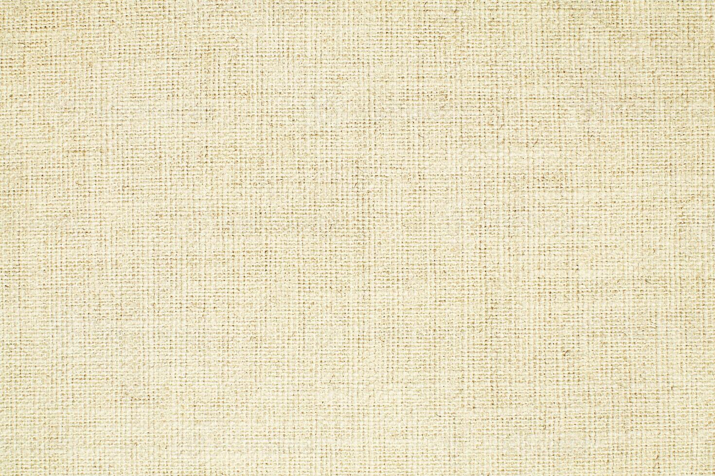Natural linen material textile canvas Fabric texture background Close-up detail of fabric natural color Hemp material pattern design wallpaper. can be used as background or for graphic design photo