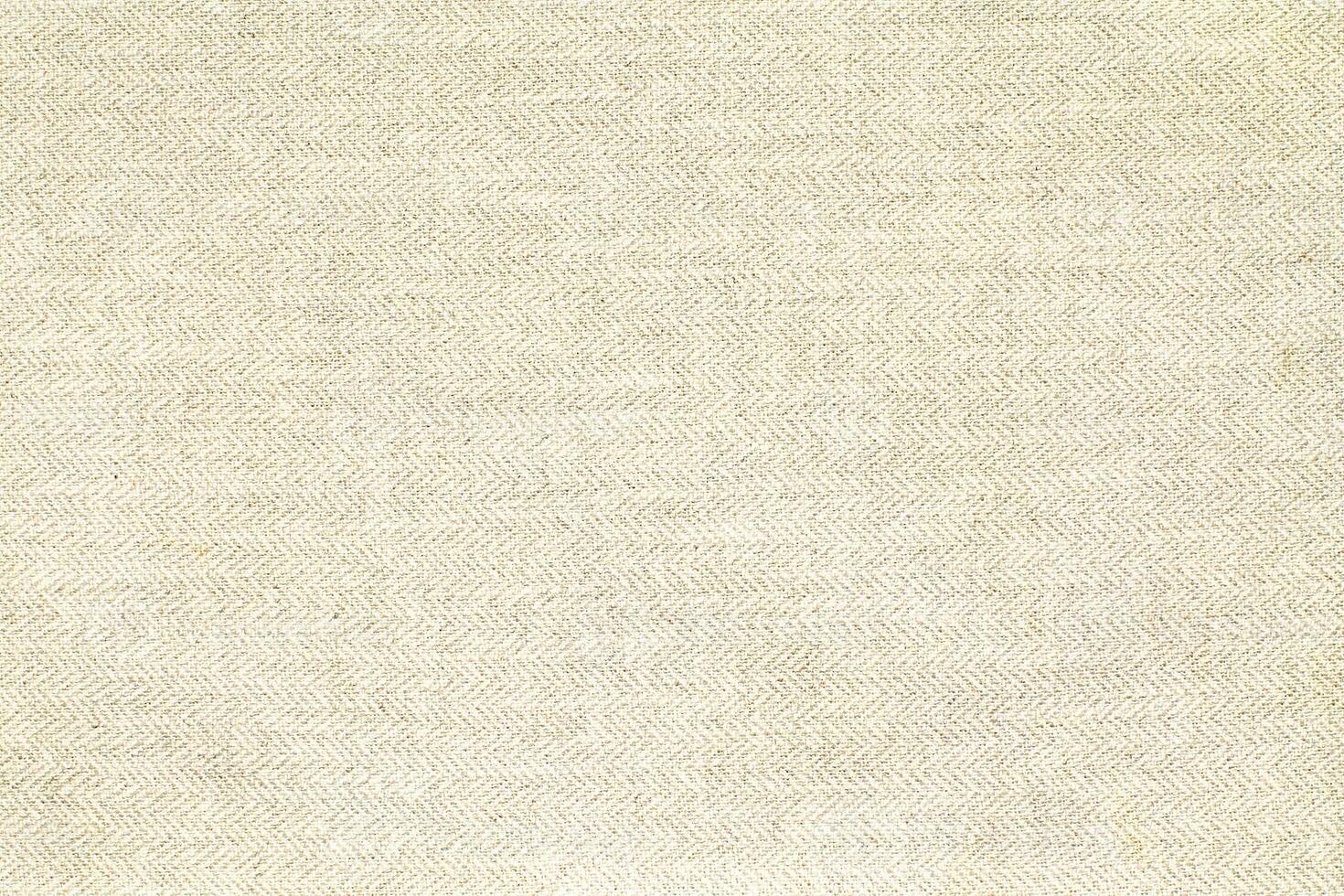 Natural linen material textile canvas Fabric texture background Close-up detail of fabric natural color Hemp material pattern design wallpaper. can be used as background or for graphic design photo