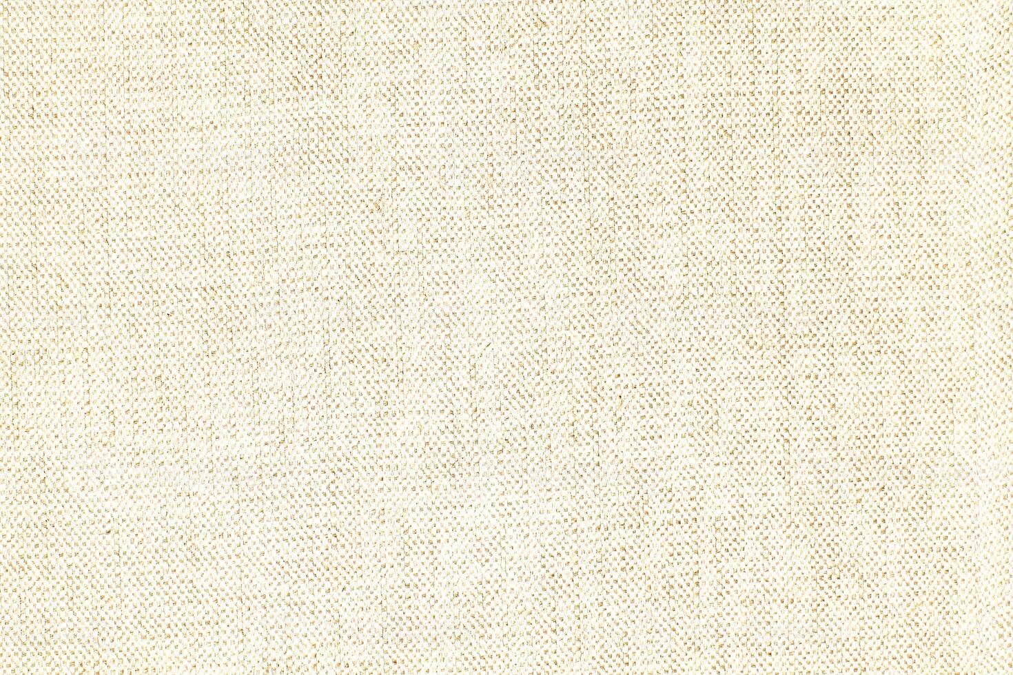 Natural linen material textile canvas Fabric texture background Close-up detail of fabric natural color Hemp material pattern design wallpaper. can be used as background or for graphic design photo