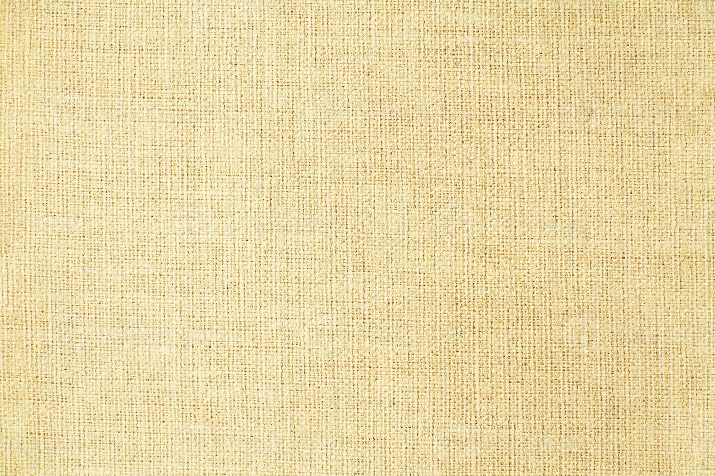 Natural linen material textile canvas Fabric texture background Close-up detail of fabric natural color Hemp material pattern design wallpaper. can be used as background or for graphic design photo