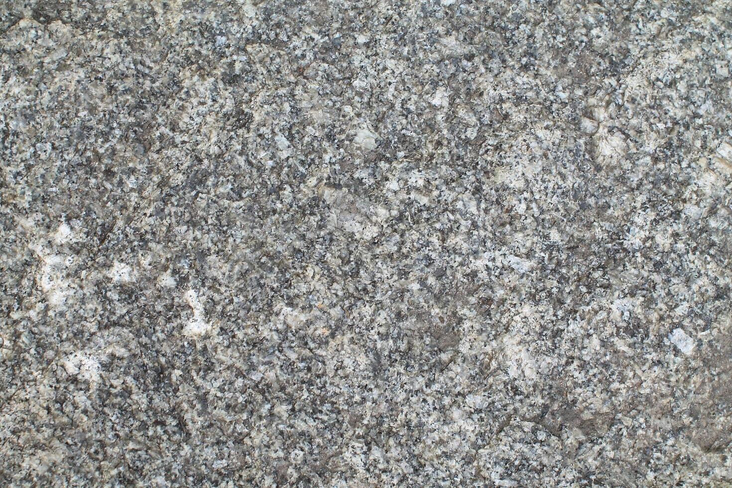 Abstract natural rock stone granite grunge rusty metal texture design background natural color stone material granite design wallpaper. Close-up detail of natural stone photo
