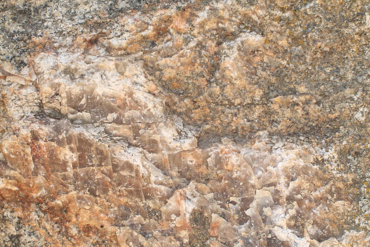 Abstract natural rock stone granite grunge rusty metal texture design background natural color stone material granite design wallpaper. Close-up detail of natural stone photo