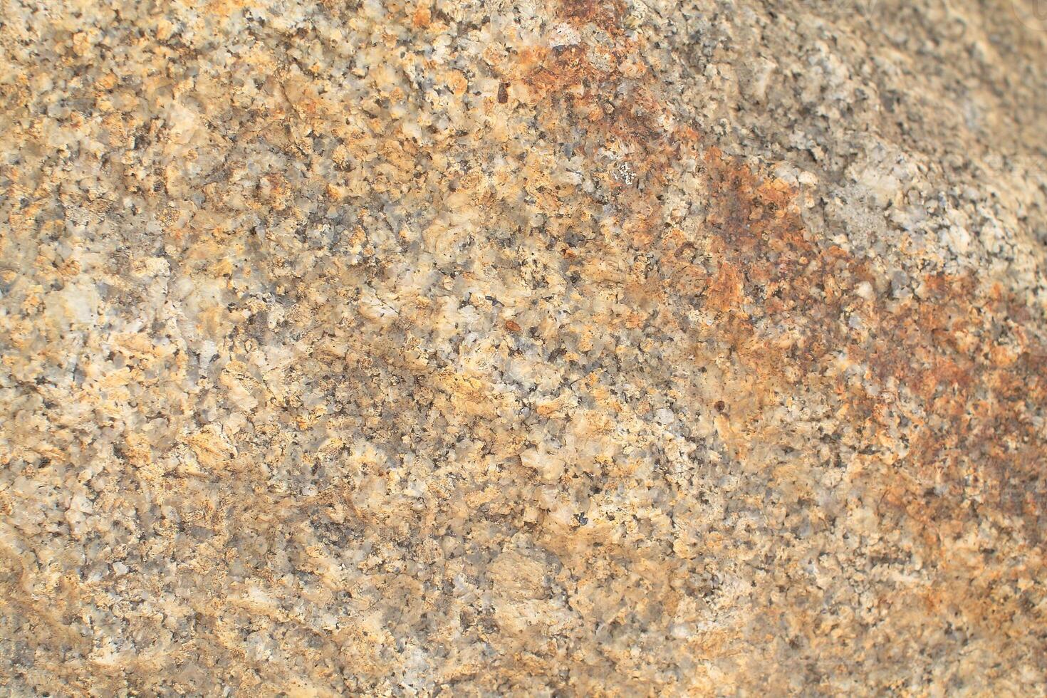Abstract natural rock stone granite grunge rusty metal texture design background natural color stone material granite design wallpaper. Close-up detail of natural stone photo