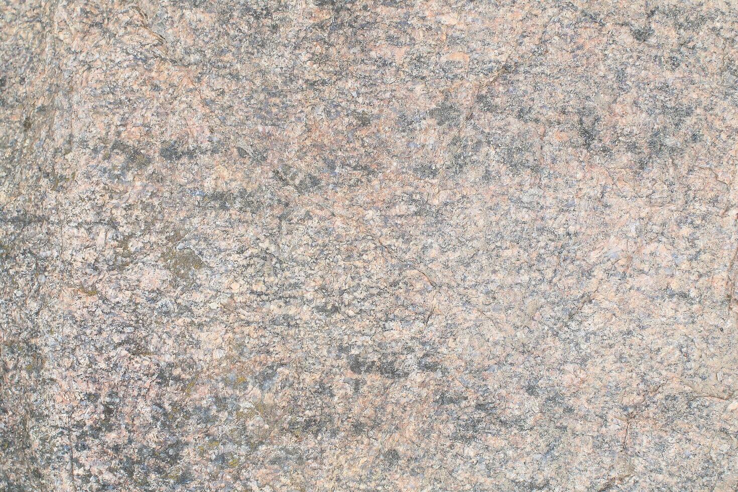 Abstract natural rock stone granite grunge rusty metal texture design background natural color stone material granite design wallpaper. Close-up detail of natural stone photo